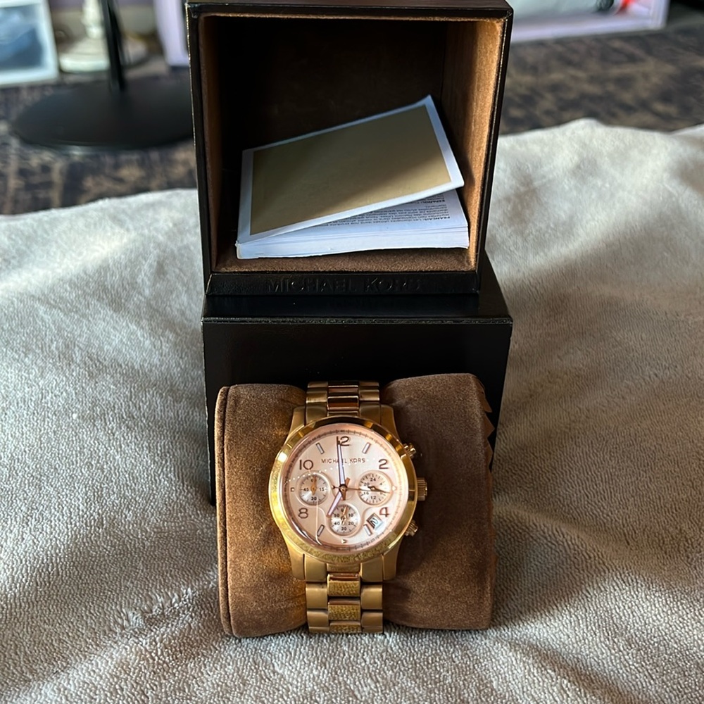 I have a Michael Kors stainless steel Rose Gold tone watch